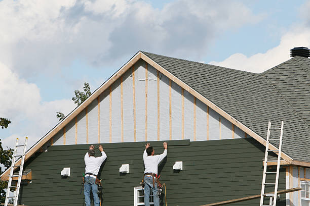 Professional Siding Replacement technician working in Forest City, FL